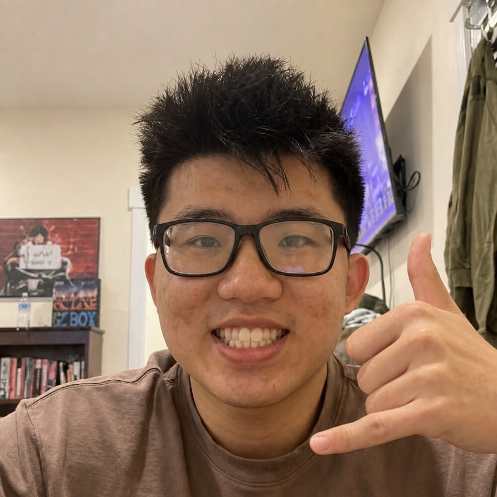 Jaehoon Son smiling and making a shaka gesture